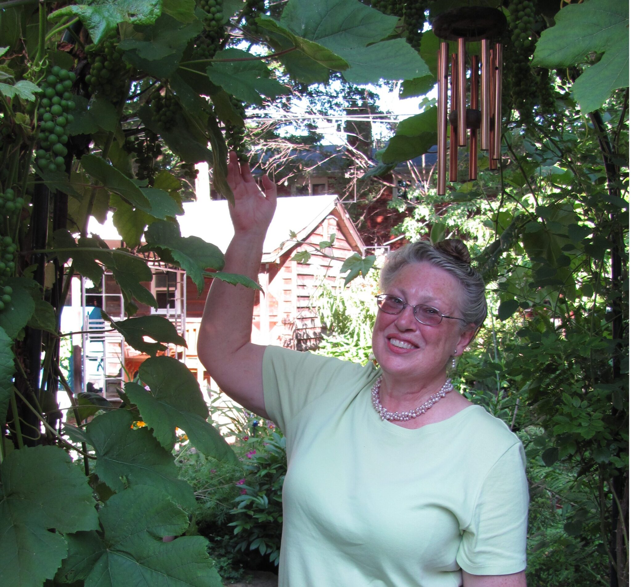 20170801 Rebe with grapes small - Reb Guenette